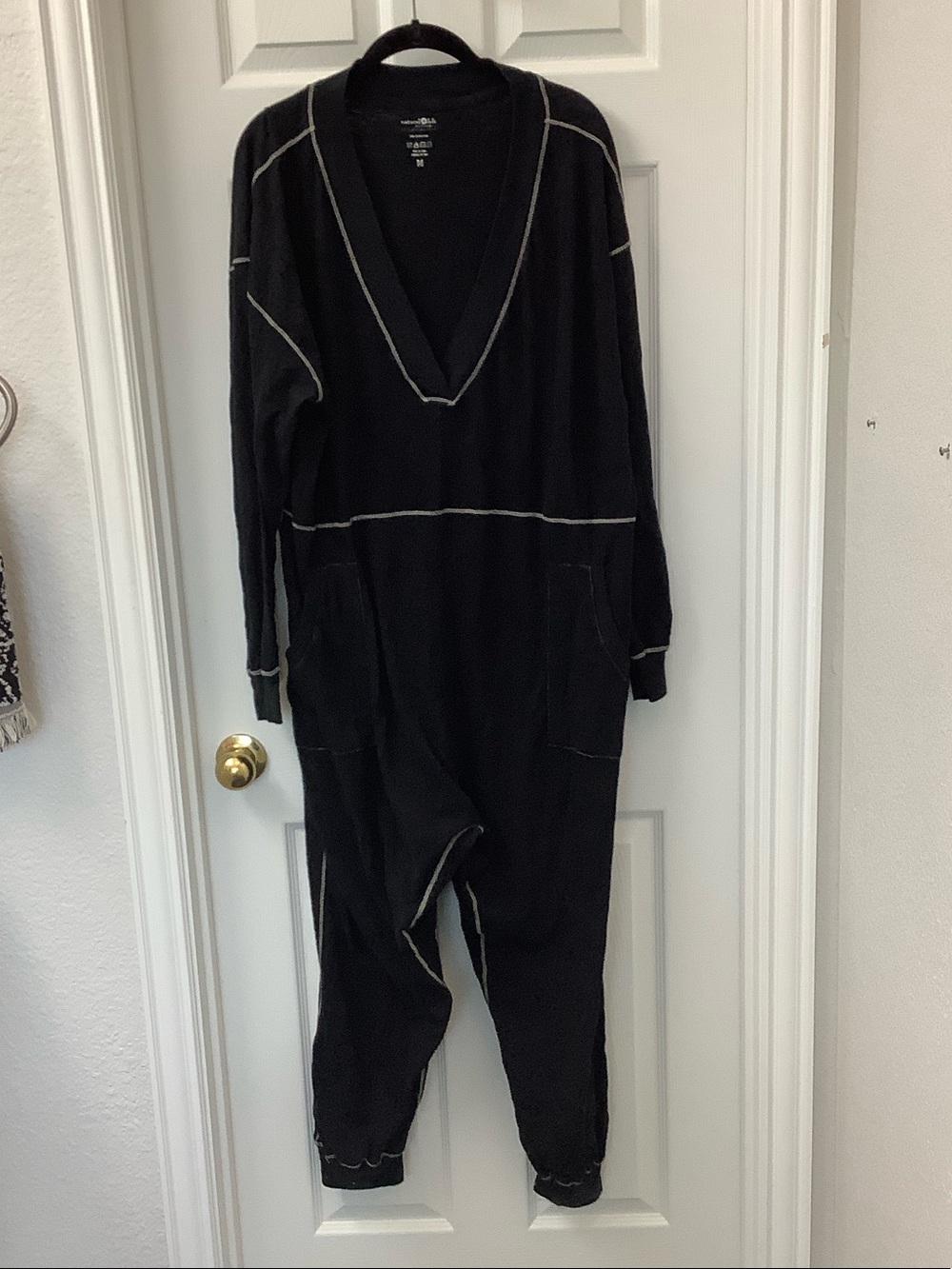 NATURAL LIFE Black V‑Neck Jumpsuit with Contrast Stitching